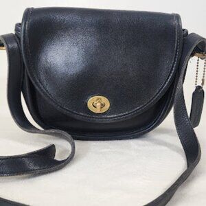 Coach Watson. Normal signs of use. Classic Vintage Piece.